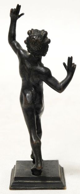Statuette in bronze with brown patina representing...