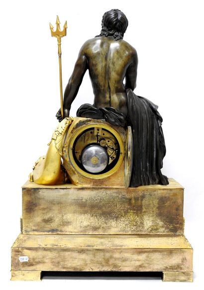 
Important clock called Neptune in patinated...