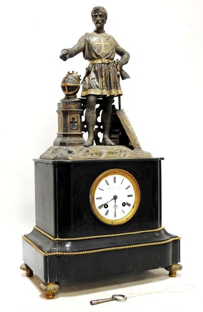 Black marble clock decorated with friezes...