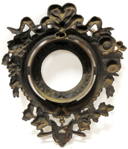 A gilt bronze frame for a cartel decorated...