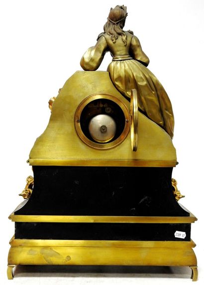 Clock in gilded bronze and patinated bronze...