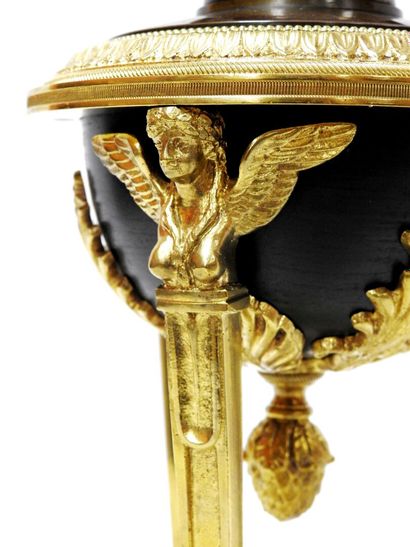 Lamp stand in chased ormolu and black lacquered...