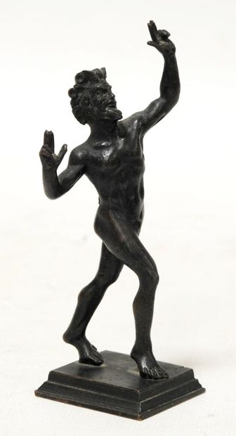 Statuette in bronze with brown patina representing...