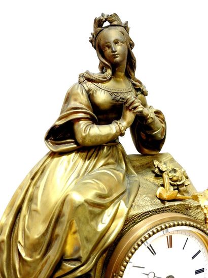 Clock in gilded bronze and patinated bronze...