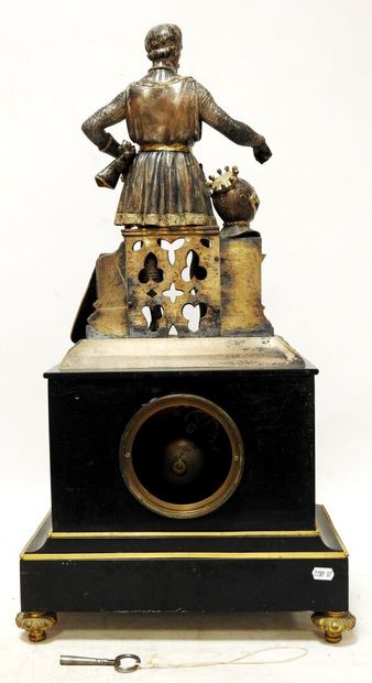 Black marble clock decorated with friezes...