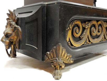 Bronze clock with brown patina representing...