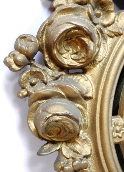 A gilt bronze frame for a cartel decorated...
