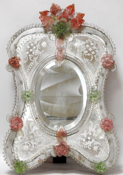 Mirror of toilet with parecloses engraved...