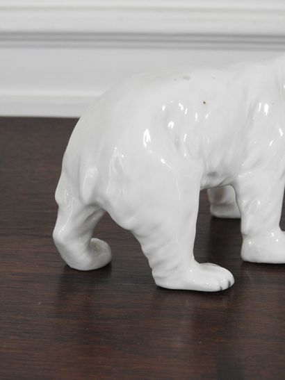 SUBJECT in polychrome porcelain representing...