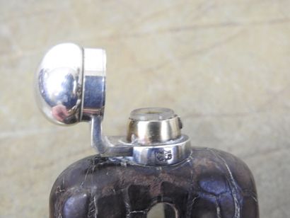 ALCOHOL FLASK in silver plated metal covered...