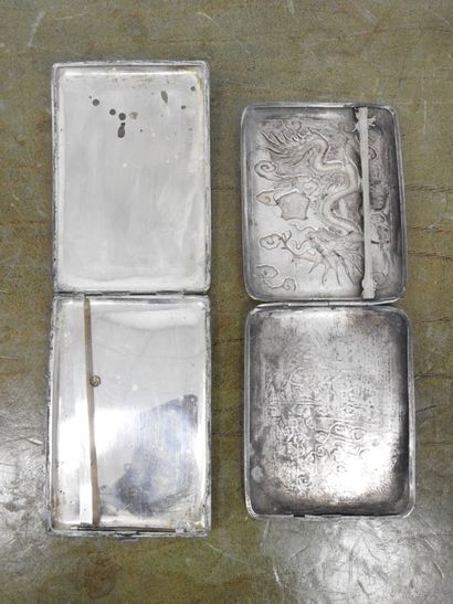 TWO CIGARETTES SUITS in silver with dragons...