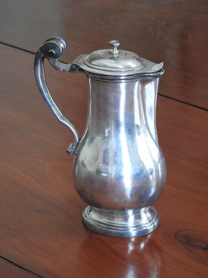 A small silvered bronze baluster, the handle...