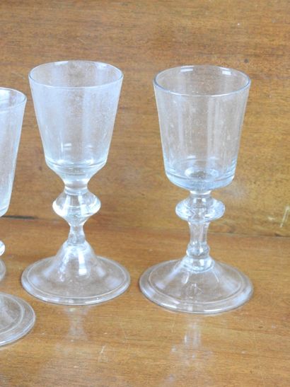 Suite of FOURTEEN GLASSES on foot in blown...