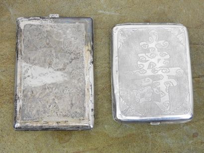 TWO CIGARETTES SUITS in silver with dragons...