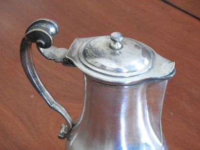 A small silvered bronze baluster, the handle...