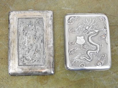 TWO CIGARETTES SUITS in silver with dragons...