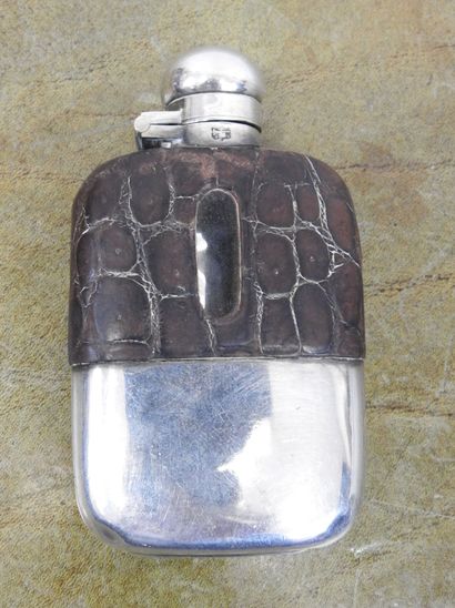 ALCOHOL FLASK in silver plated metal covered...