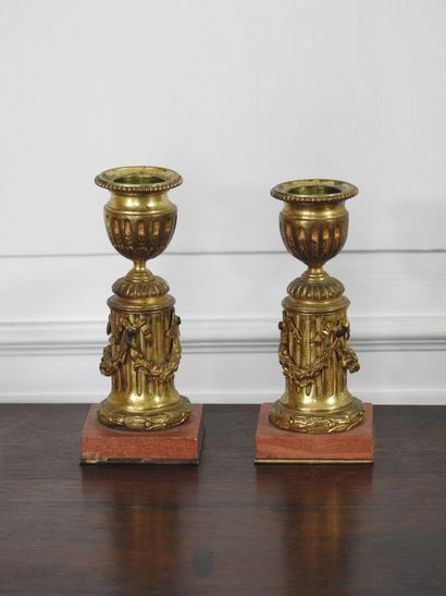 Pair of SMALL CANDLES in chased and gilded...