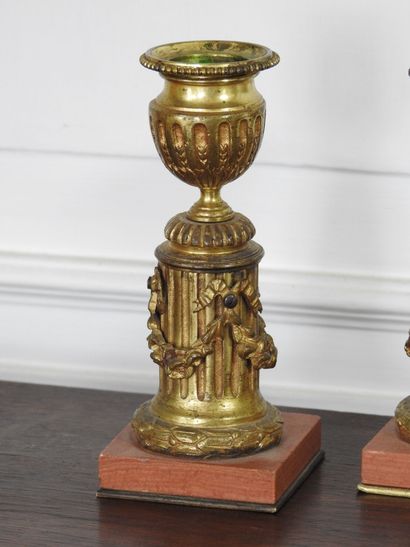 Pair of SMALL CANDLES in chased and gilded...