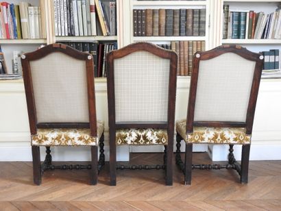 Suite of THREE CHAIRS in natural wood with...