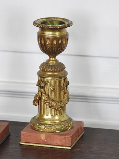 Pair of SMALL CANDLES in chased and gilded...