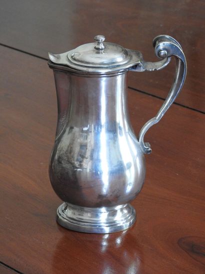 A small silvered bronze baluster, the handle...