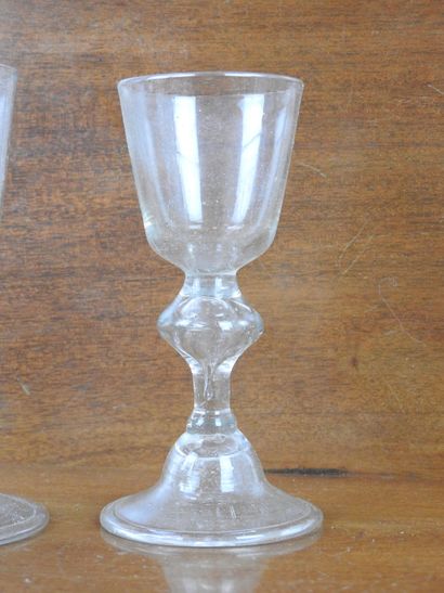 Suite of FOURTEEN GLASSES on foot in blown...