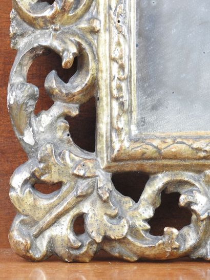 SMALL MIRROR in carved and gilded wood of...