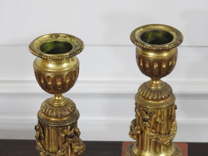 Pair of SMALL CANDLES in chased and gilded...