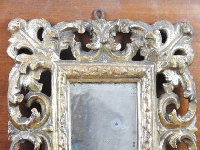 SMALL MIRROR in carved and gilded wood of...