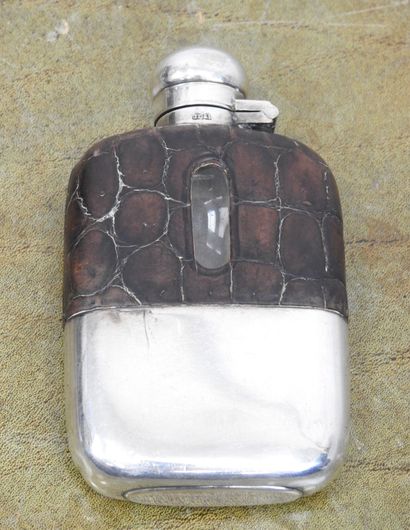 ALCOHOL FLASK in silver plated metal covered...