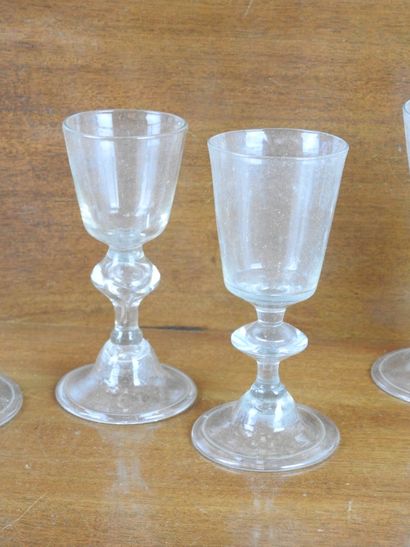Suite of FOURTEEN GLASSES on foot in blown...