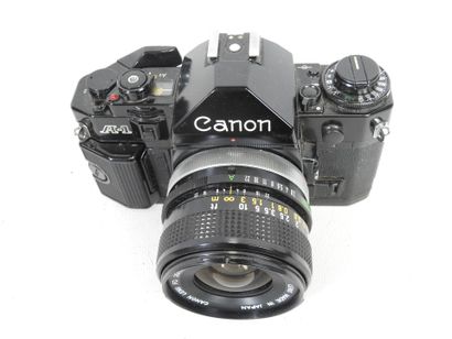 CANON. Appareil photo modèle A-1 noir n°719400...