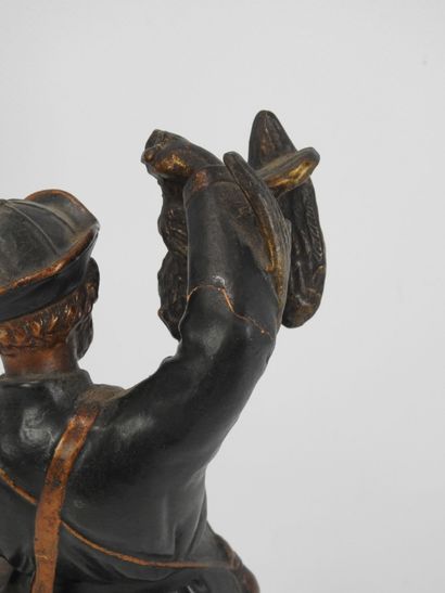 DEUX CHASSEURS en terre cuite à patine polychrome....