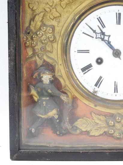 Pendule à décor de chasse et de chasseur,...