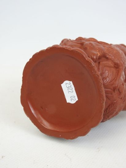 PICHET en biscuit marron à décor tournant...