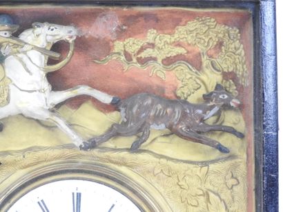 Pendule à décor de chasse et de chasseur,...