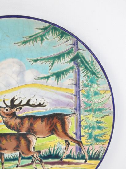 LONGWY : Plat circulaire en émaux polychrome...