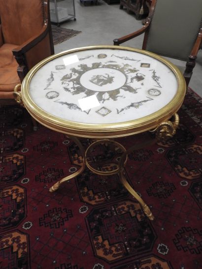 Chased-gilt bronze GUERIDON, the circular...
