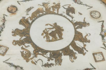 Chased-gilt bronze GUERIDON, the circular...