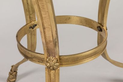 Chased-gilt bronze GUERIDON, the circular...