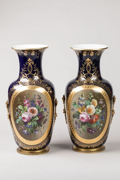 PARIS: Pair of mounted vases in polychrome...