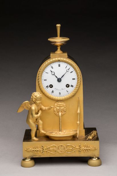 Gilt bronze HANGER with a cherub at a fountain,...