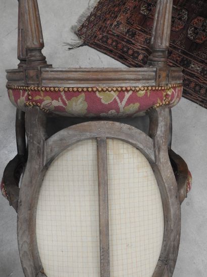 PAIR OF ARMCHAIRS in molded and carved natural...