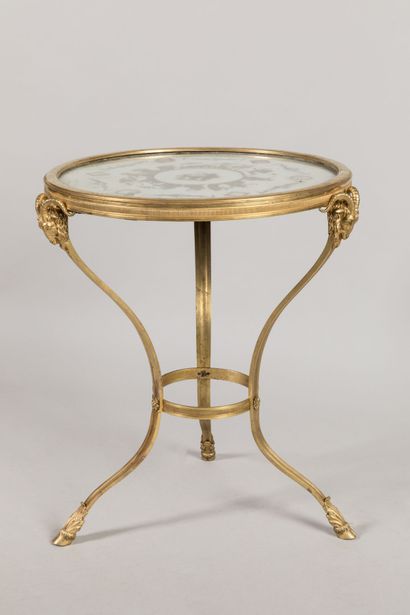Chased-gilt bronze GUERIDON, the circular...
