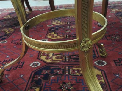 Chased-gilt bronze GUERIDON, the circular...