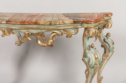 CONSOLE en bois sculpté, stuqué, laqué et...