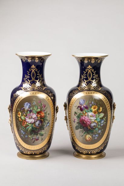 PARIS: Pair of mounted vases in polychrome...