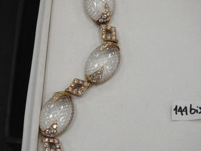 M. GERARD: Necklace in yellow gold 750 thousandths...
