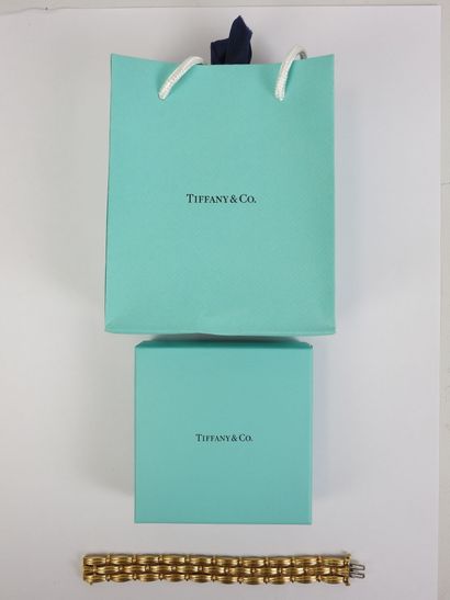 TIFFANY & CO: Three-row articulated bracelet...